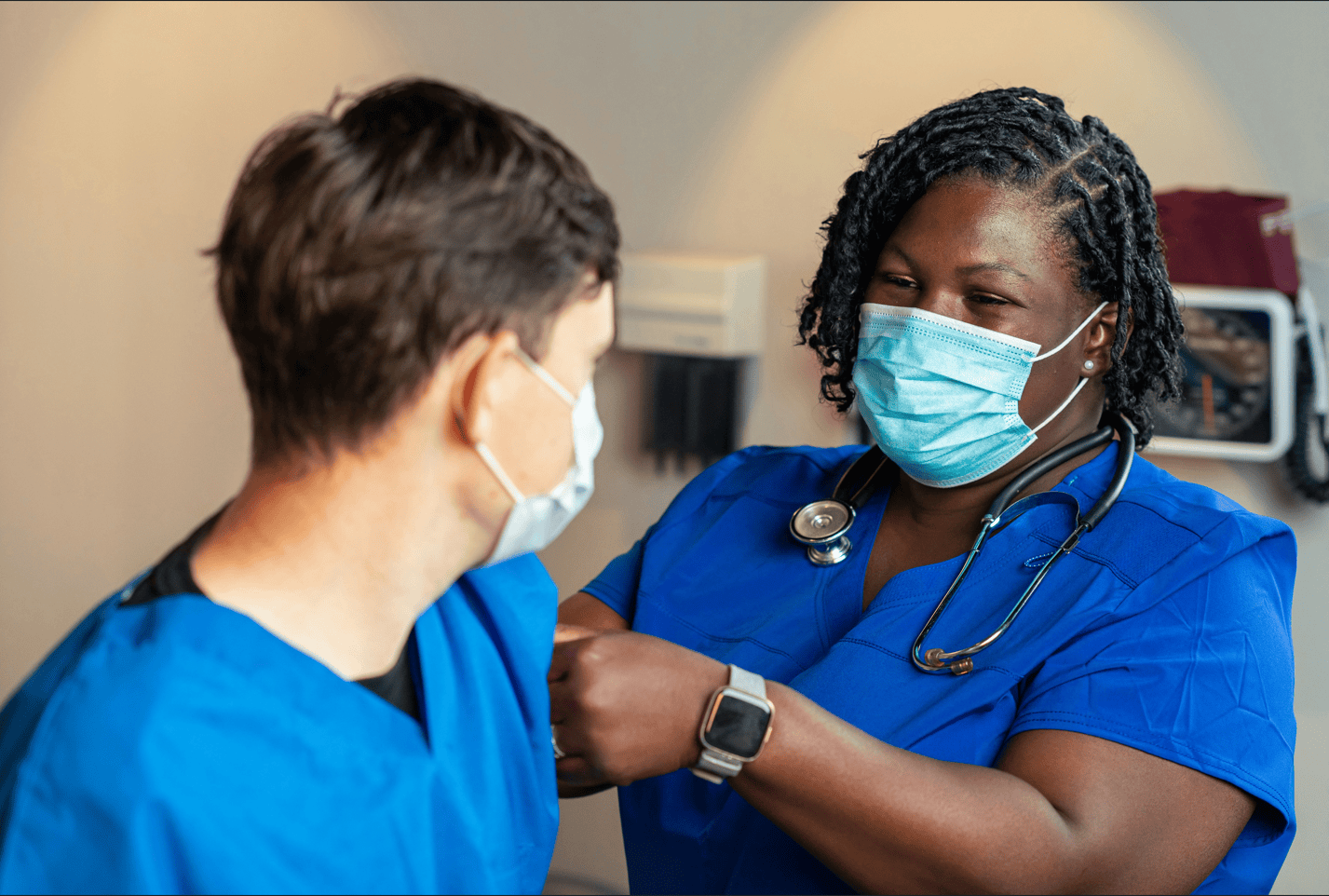 Nurse helping a patient, representing the Care Management team at TCT Consultants on Long Island